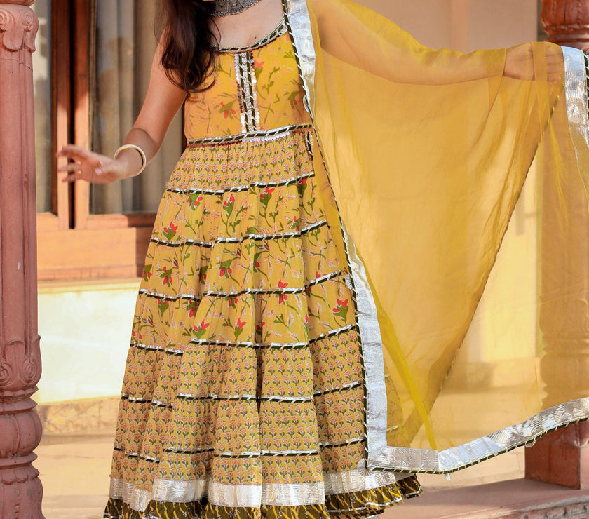 Divena Yellow Cotton Sleeves less anarkali Skirt Set With Dupatta - divenaworld.com