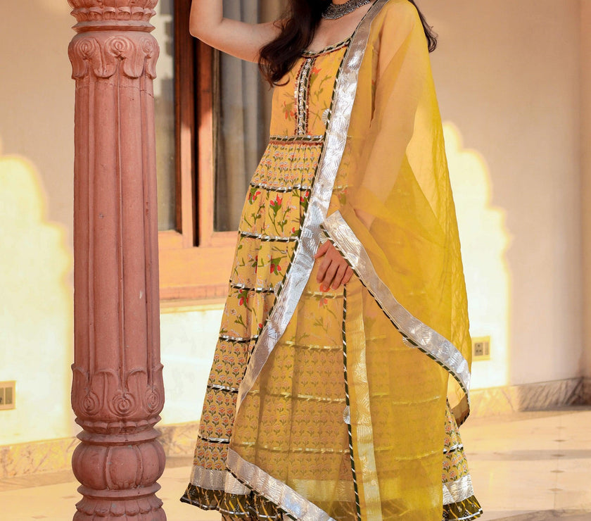 Divena Yellow Cotton Sleeves less anarkali Skirt Set With Dupatta - divenaworld.com