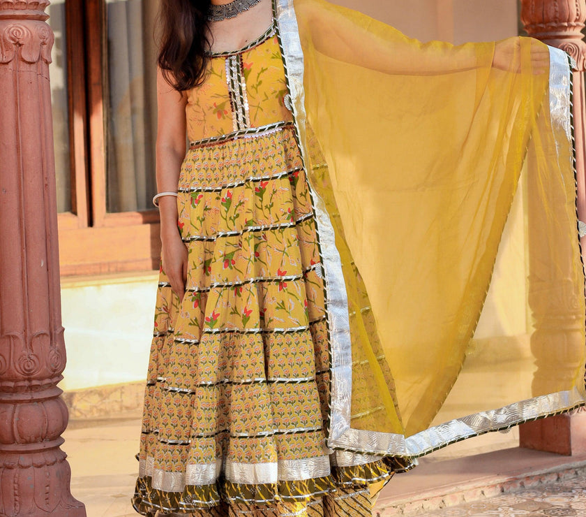 Divena Yellow Cotton Sleeves less anarkali Skirt Set With Dupatta - divenaworld.com