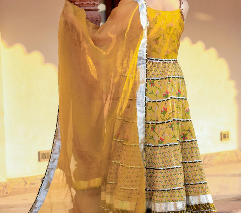 Divena Yellow Cotton Sleeves less anarkali Skirt Set With Dupatta - divenaworld.com