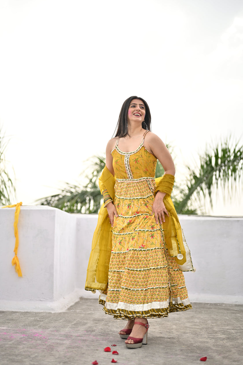 Divena Yellow Cotton Sleeves less anarkali Skirt Set With Dupatta