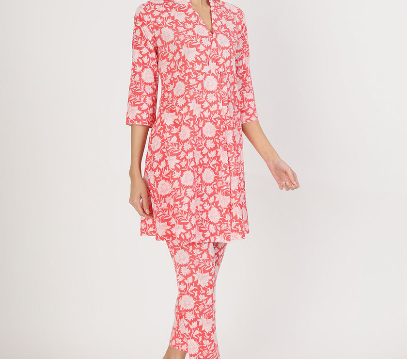 Divena Pink Floral Printed Cotton Kurta with Herem Pant Co ord Set